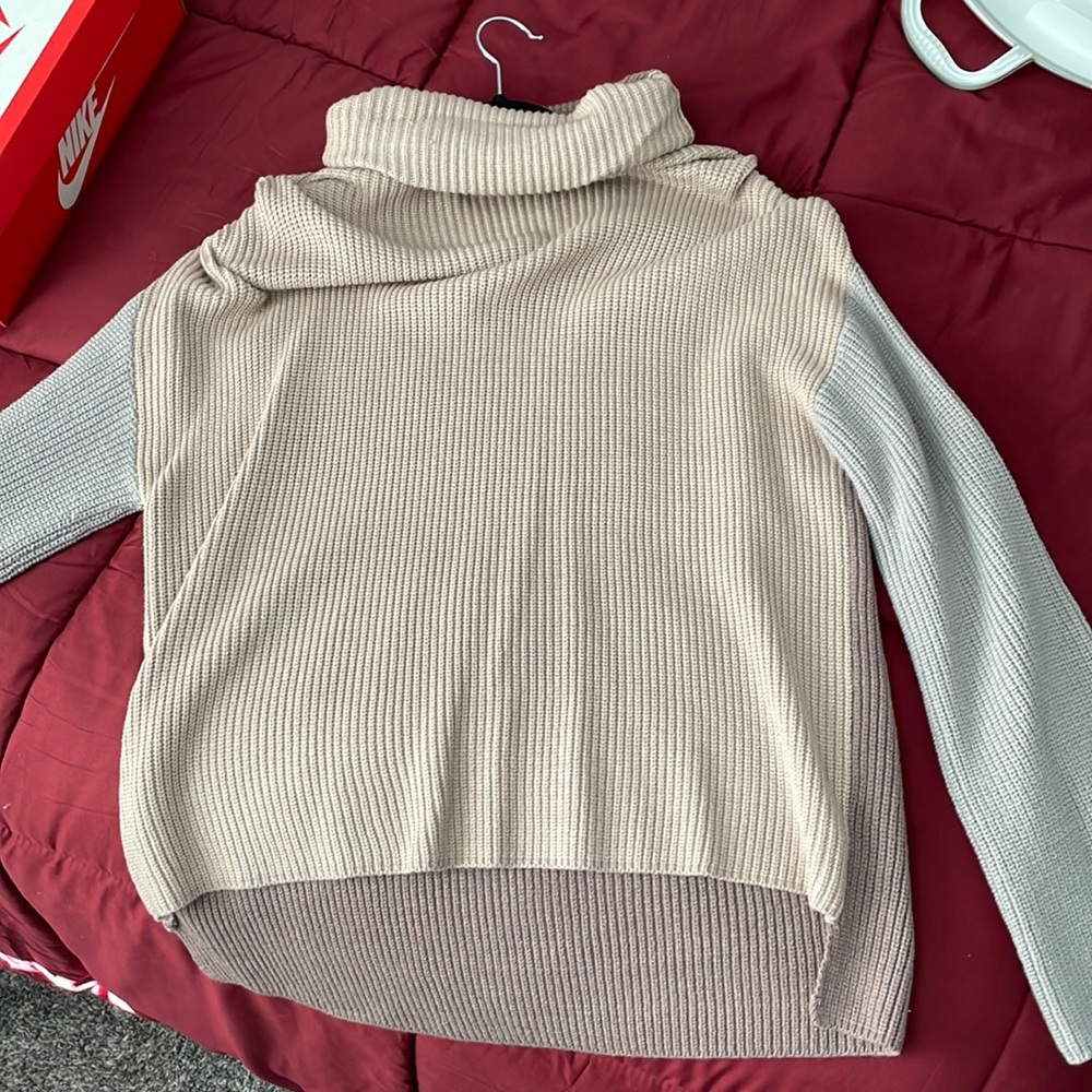 Cowl neck with grey sleeves, brown back and light tan front.